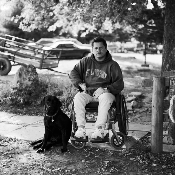 Man in Wheelchair with Dog